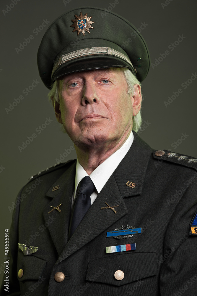 US military general in uniform. Studio portrait. US military general in uniform. Studio portrait.