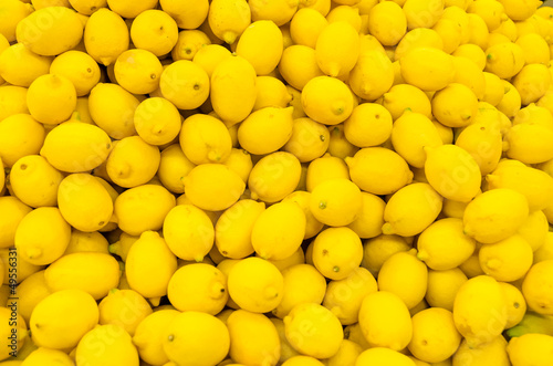 Colorful Display Of Lemons In A Market
