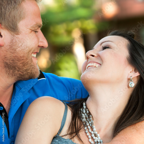 In love couple smiling at each other.