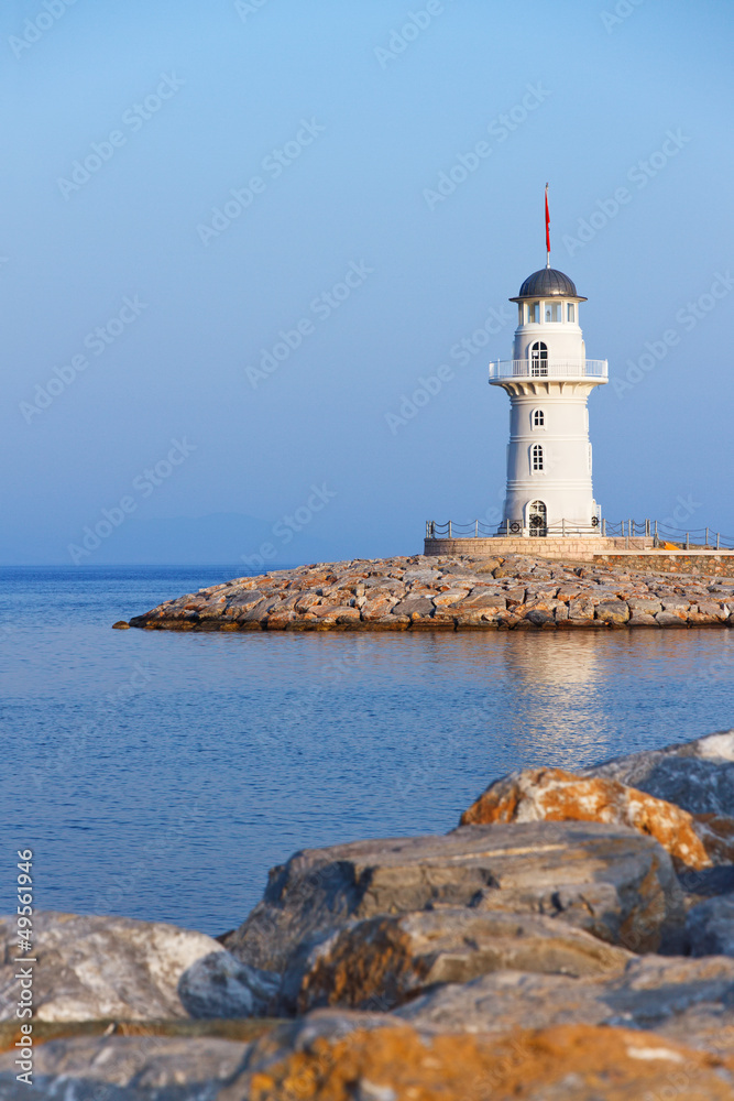 lighthouse on a sea cape