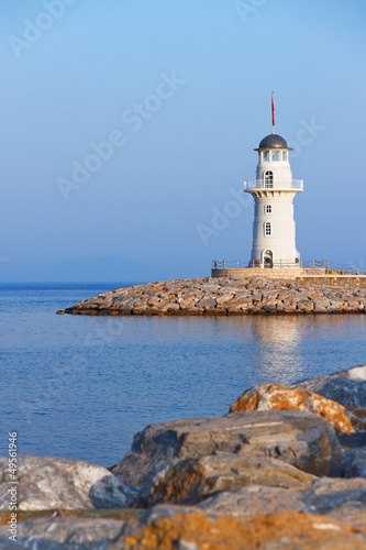 lighthouse on a sea cape