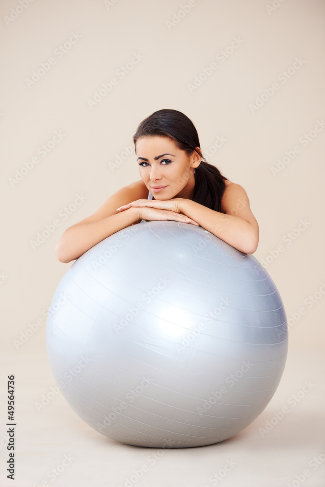 Woman relaxing after exercises Woman relaxing after exercises
