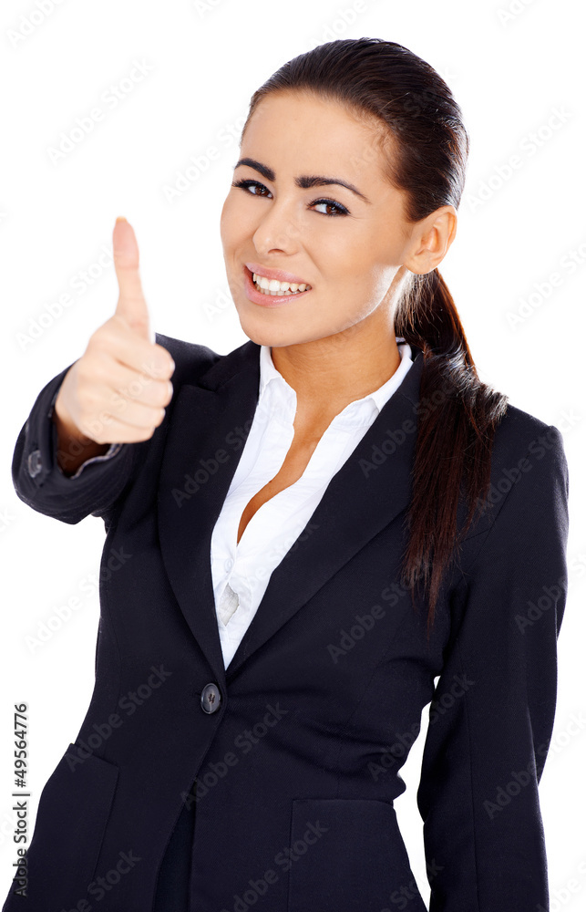 Business woman showing thumb up gesture Business woman showing thumb up gesture