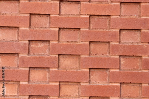 Pattern and texture of interesting red brick wall © reezabrat