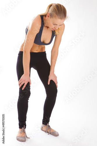 woman practices yoga on a white background, isolated..