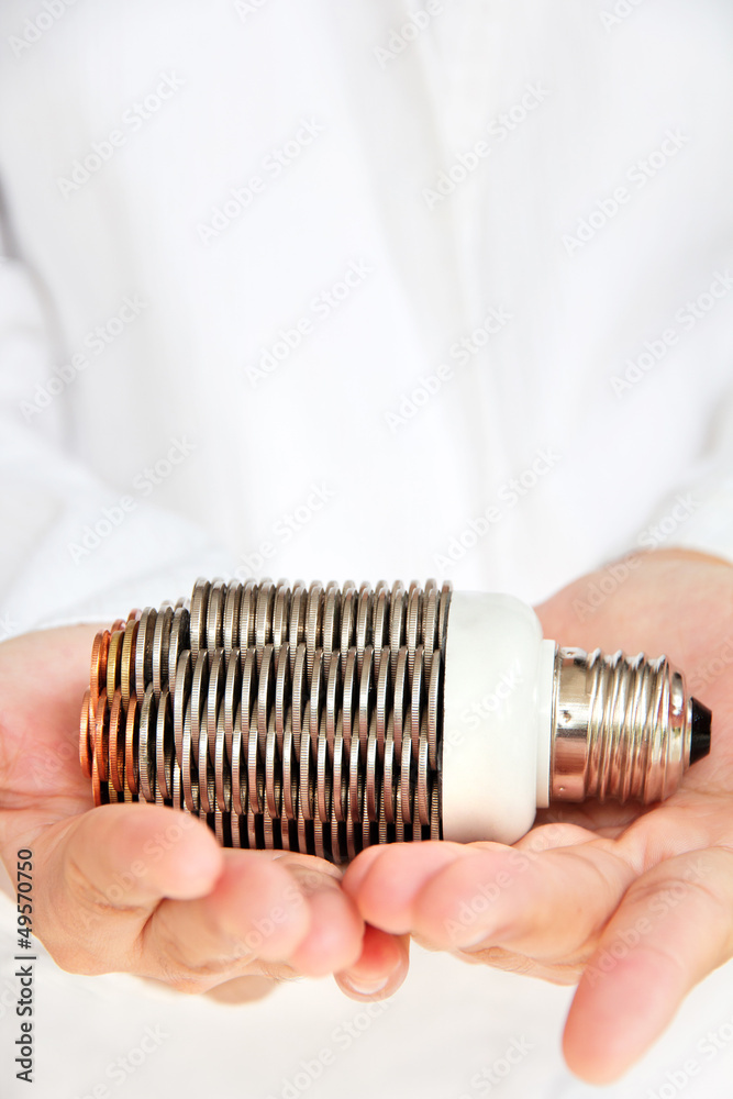 hand holding coin light bulb concept hand holding coin light bulb concept