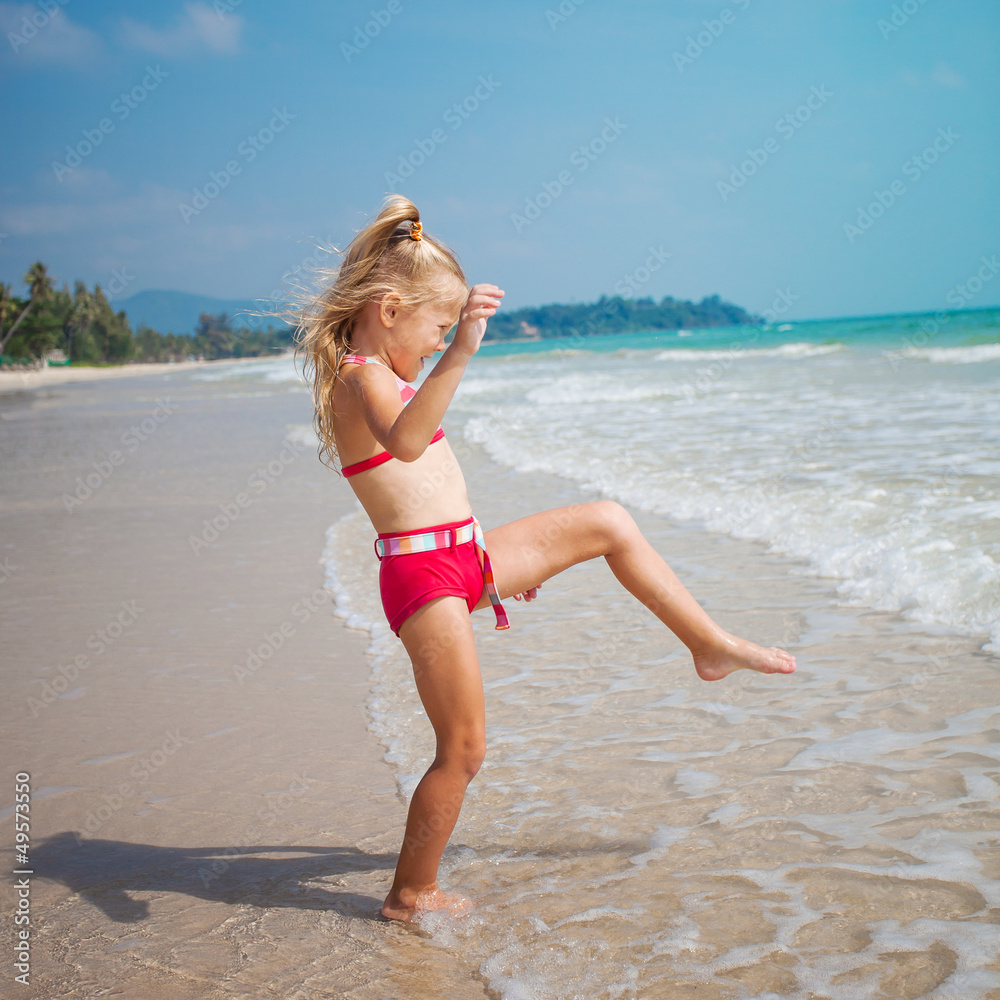 flying jump beach girl on blue sea shore in summer vacation flying jump beach girl on blue sea shore in summer vacation