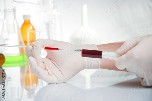 doctor taking some blood samples