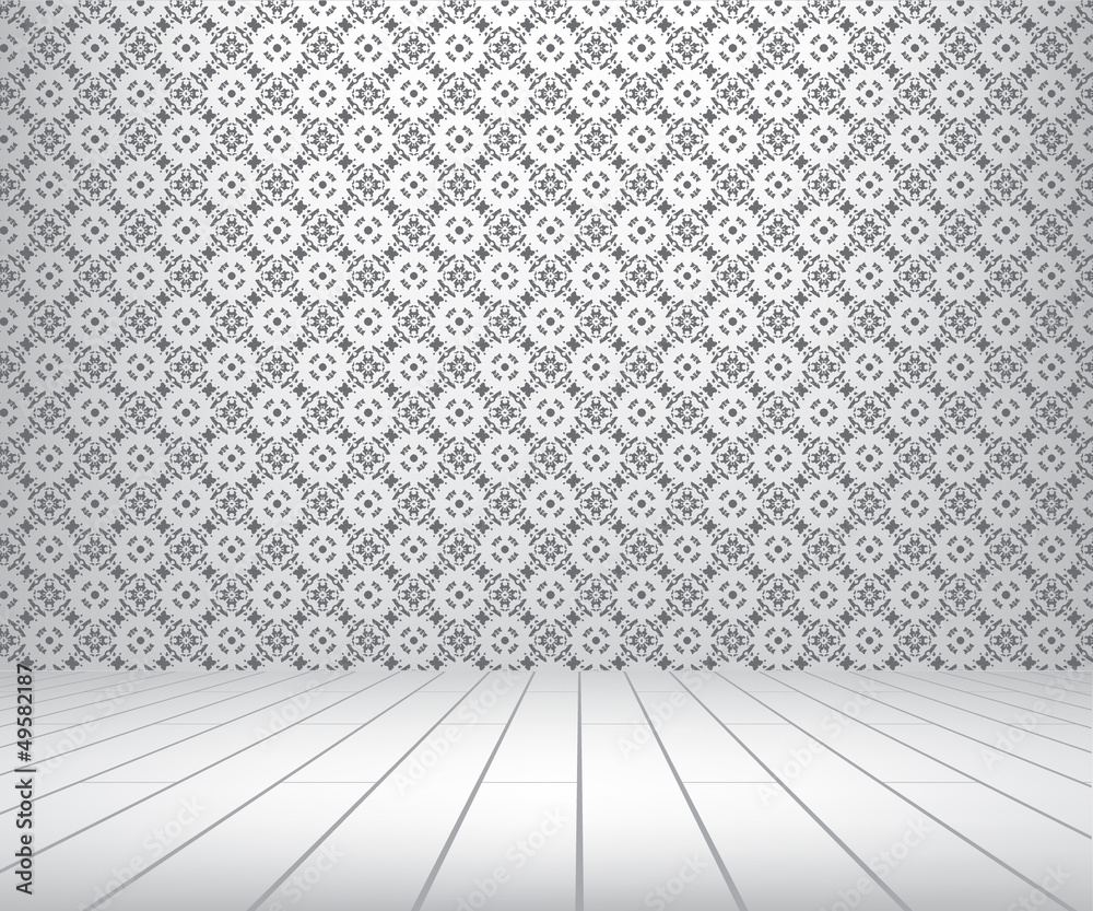 White room with pattern wall and wooden floor