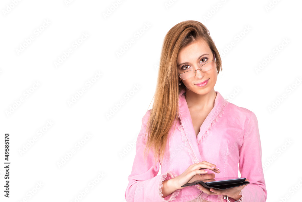 Beautiful business girl in a pink suit with a tablet PC Beautiful business girl in a pink suit with a tablet PC