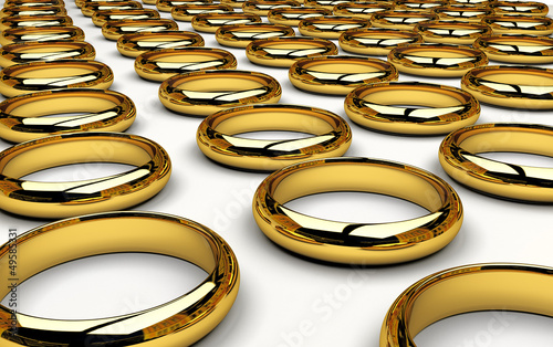 Pila di fedi anelli d'oro matrimoniali photo