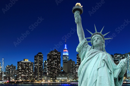 Manhattan Skyline and The Statue of Liberty at Night © Joshua Haviv