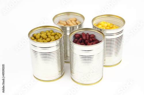 The tins with peas, bean, red bean, corn on the white background