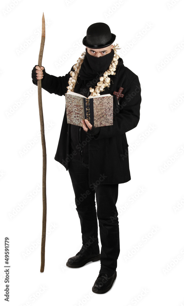 Exorcist vampire hunter in black with holly book Exorcist vampire hunter in black with holly book