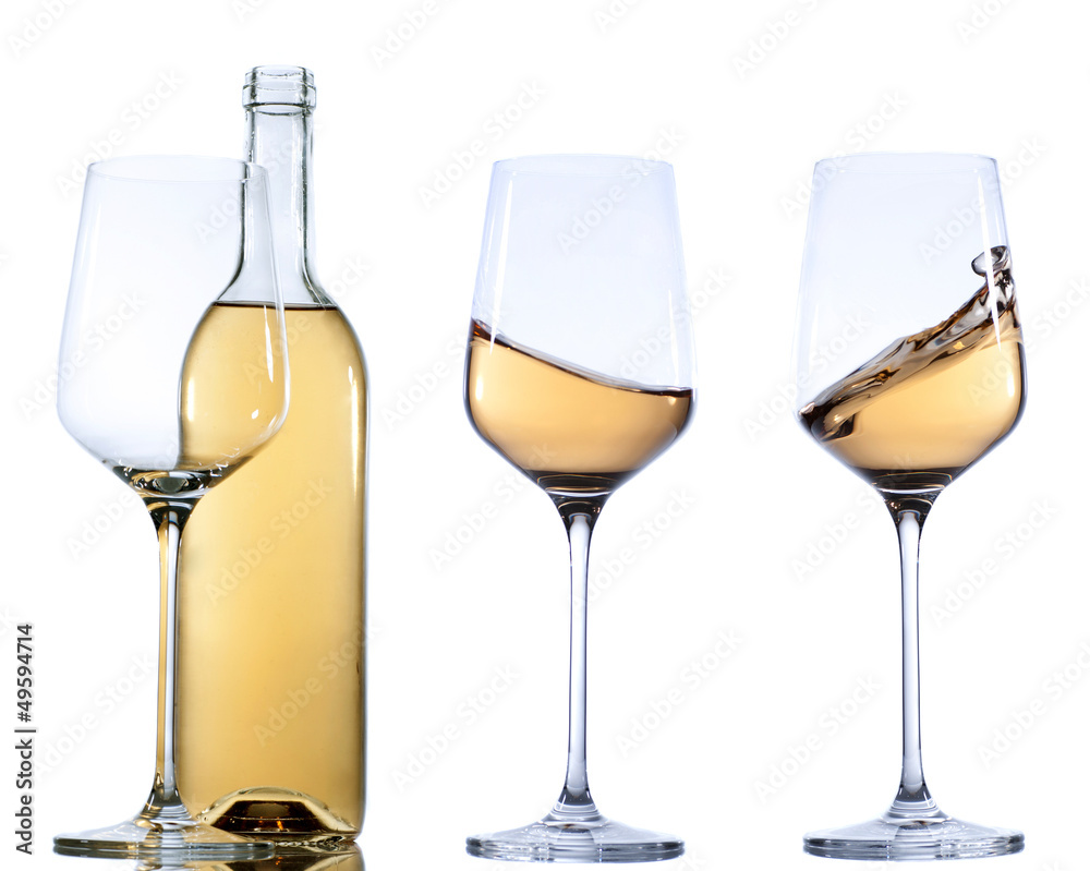 Set of glass with white wine on white background.