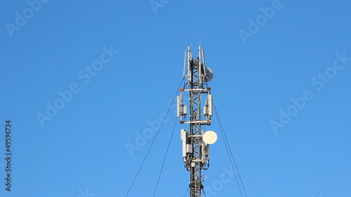 Telecommunication tower with antennas of cellular communication  photo