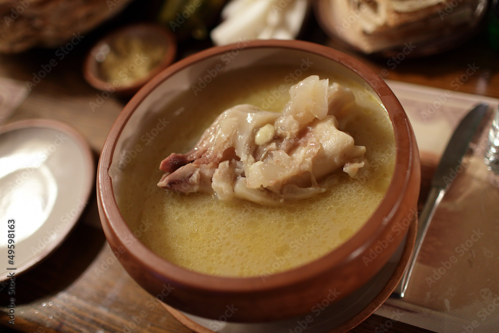 Broth with meat for Khash in armenian restaurant Broth with meat for Khash in armenian restaurant
