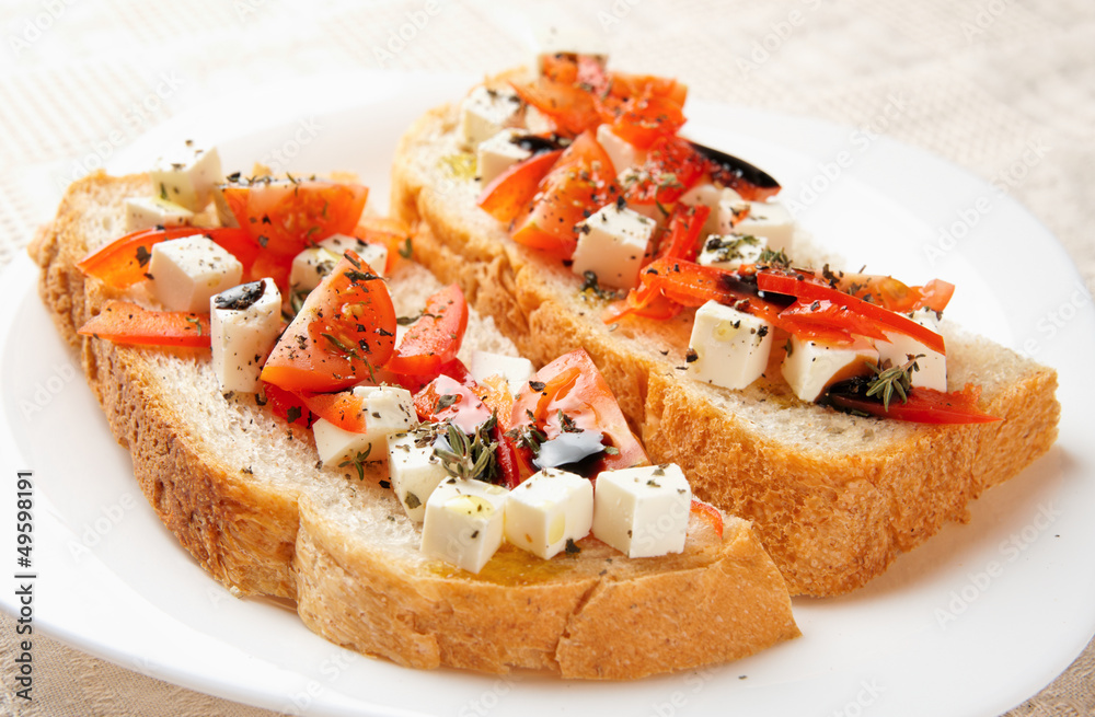 Homemade bread with feta cheese in plate
