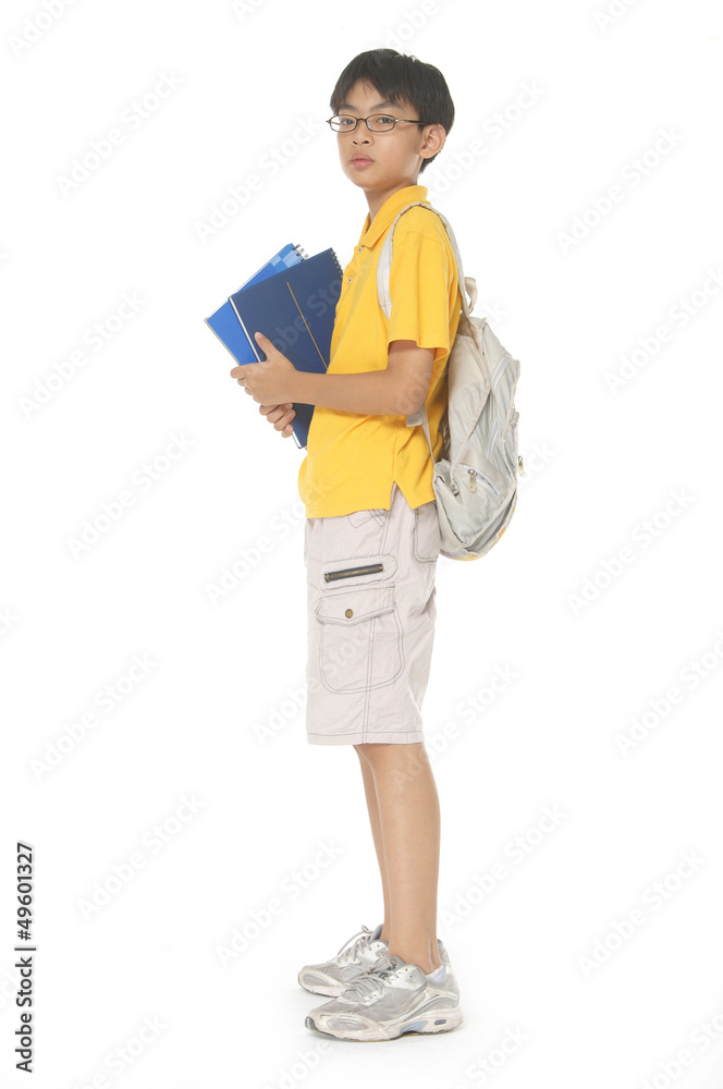 Schoolchild in glasses against white blackboard Schoolchild in glasses against white blackboard