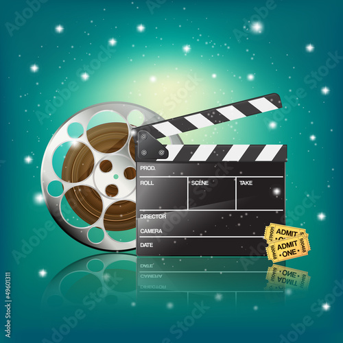 clapper,cinema tickets and film on starry background