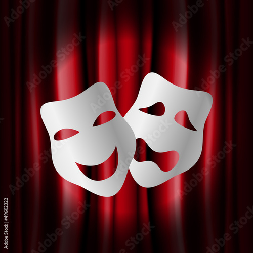 Theater masks with red curtain