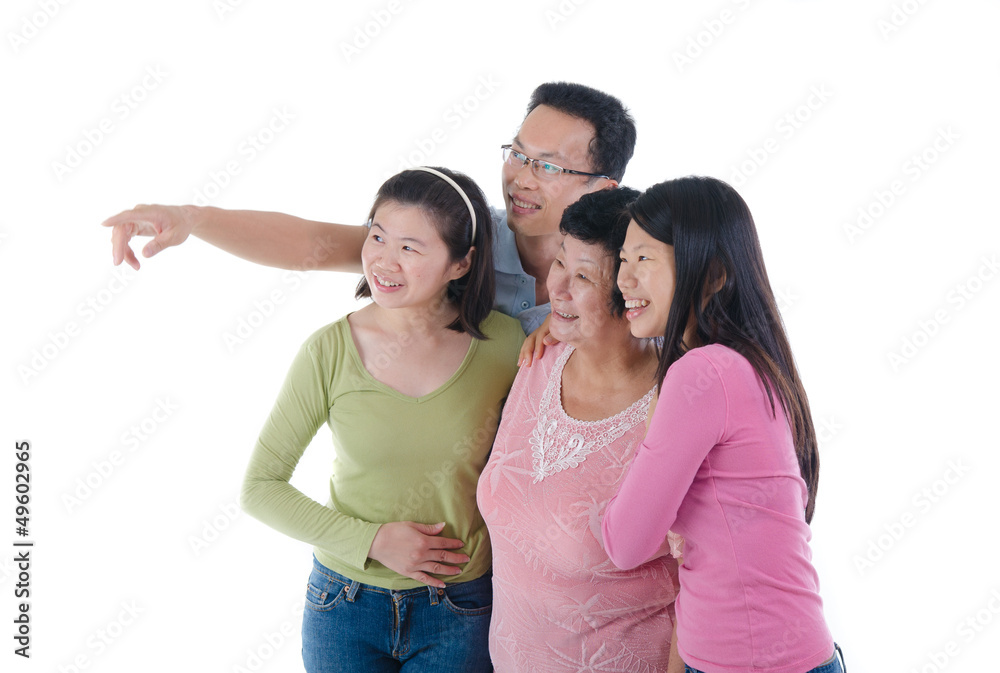 happy adult asian family pointing somewhere happy adult asian family pointing somewhere