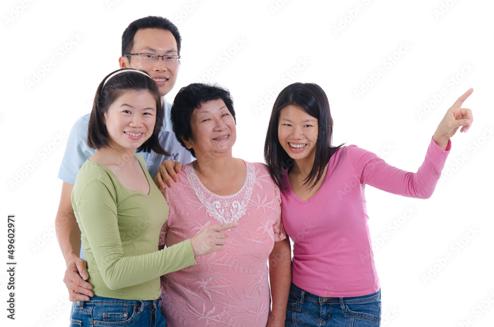 happy adult asian family pointing somewhere happy adult asian family pointing somewhere