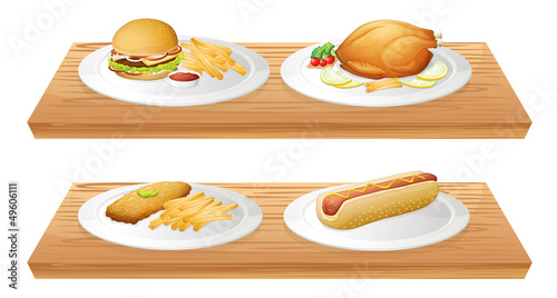 Wooden trays with plates of foods
