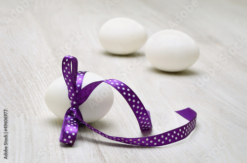 easter egg decorated with ribbon