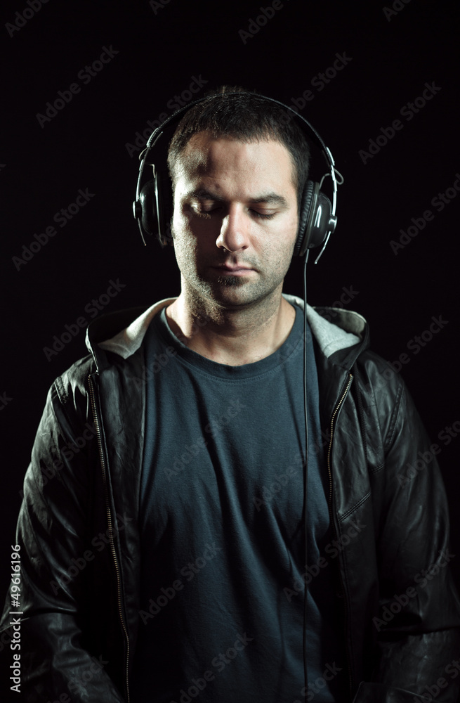 man with headphones listening music
