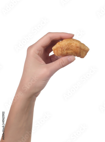 hand hold croissant