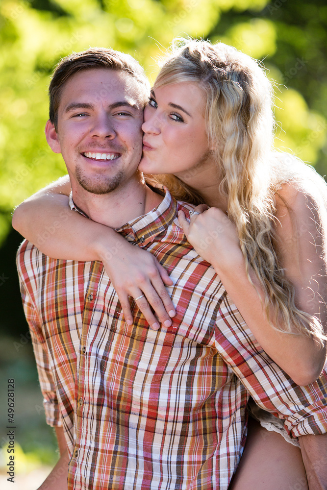Fototapeta premium Beauty kissing her man