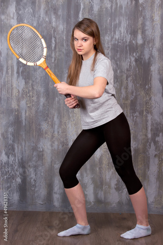 girl with tennis racket © victosha