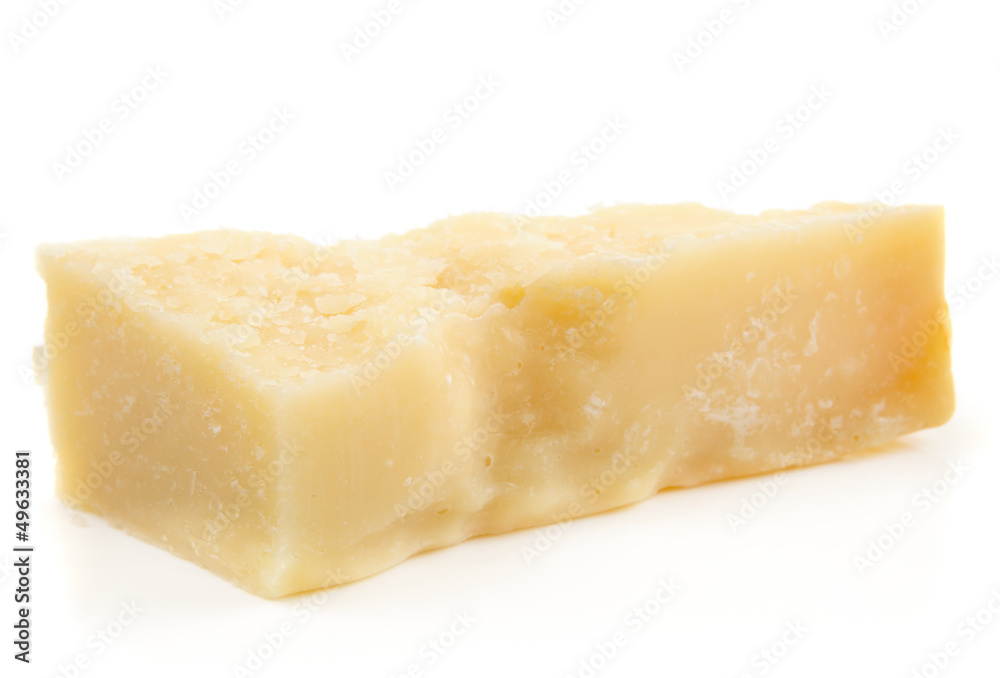 Piece of parmesan cheese isolated on white Piece of parmesan cheese isolated on white