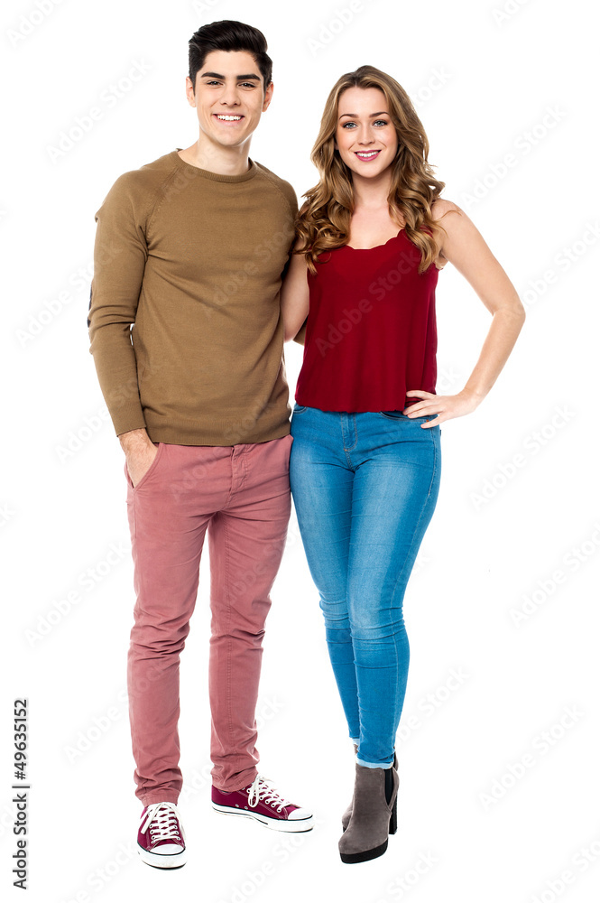 Cheerful young couple in vibrant clothing Cheerful young couple in vibrant clothing