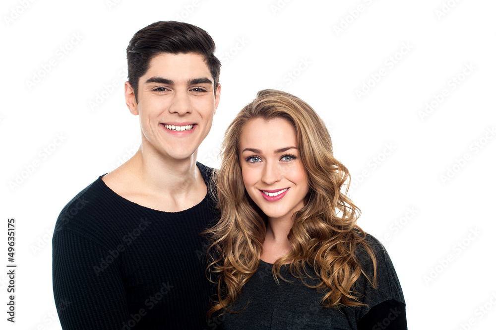 Cheerful young couple standing Cheerful young couple standing