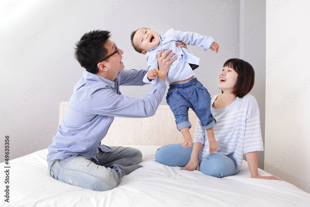 Fototapeta premium happy father hug his son at home