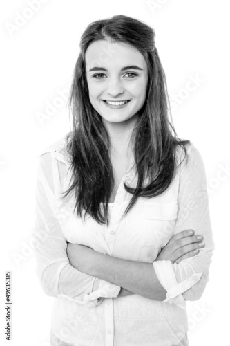 Black and white image of a confident smiling girl