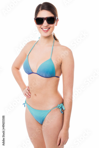 Sexy bikini model passing smile to you © stockyimages