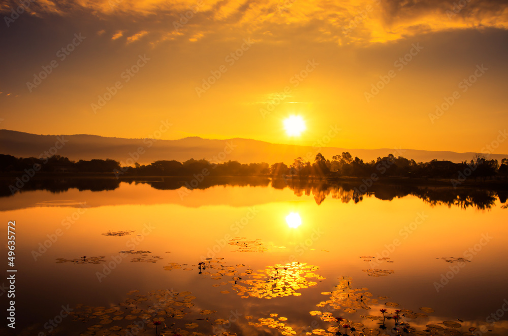 gold sunset over river