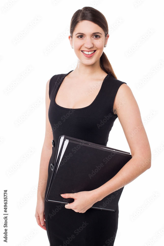 Pretty female secretary holding business files Pretty female secretary holding business files
