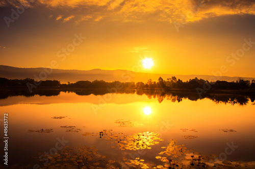 gold sunset over river © lovelyday12