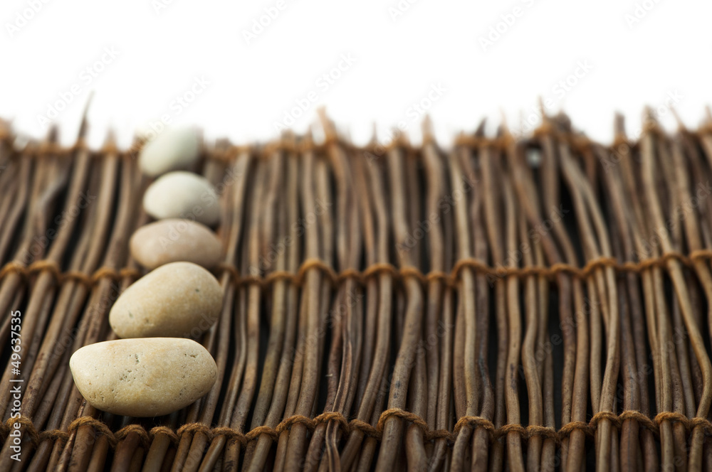 Stacked stones on wooden base Stacked stones on wooden base