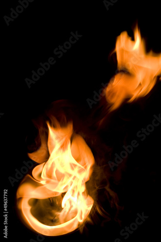 isolated fire flames on black background, darkness