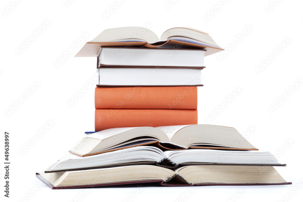 A stack of books on a white background. A stack of books on a white background.