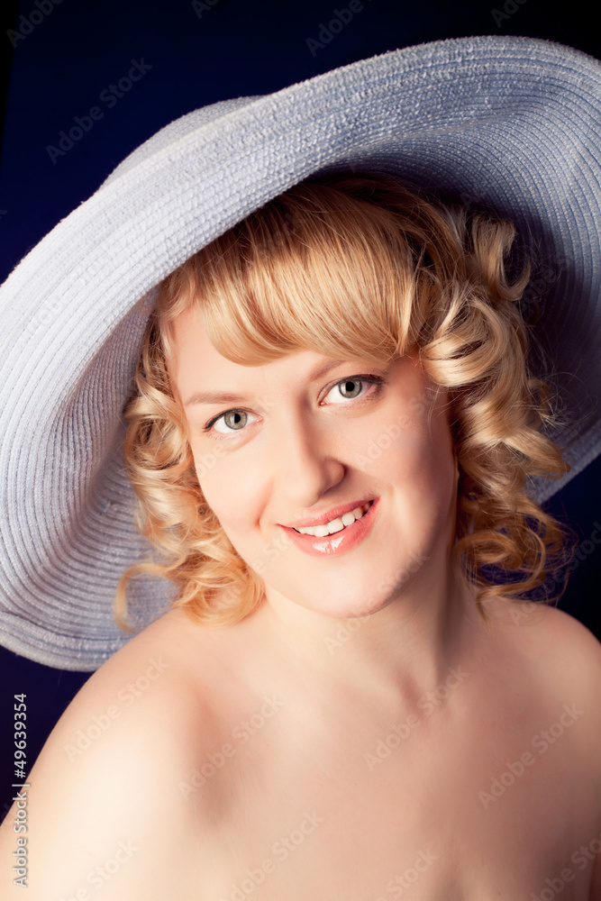 Portrait of a beautiful female model on dark background Portrait of a beautiful female model on dark background