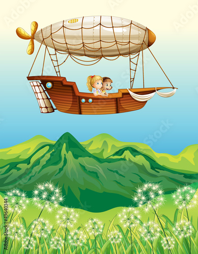 An airship carrying two young girls