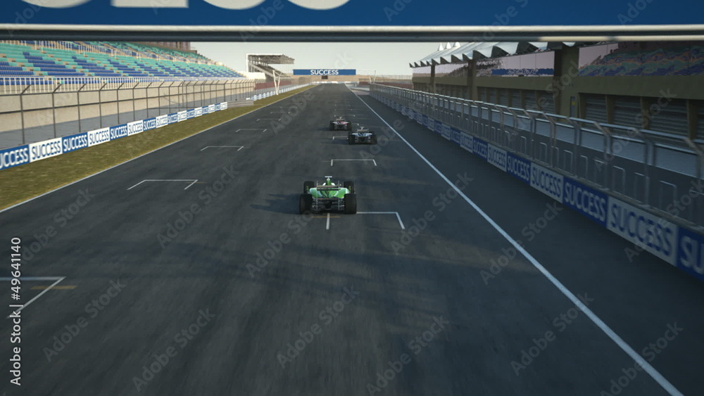 formula one racecars crossing finishing line - shot from above