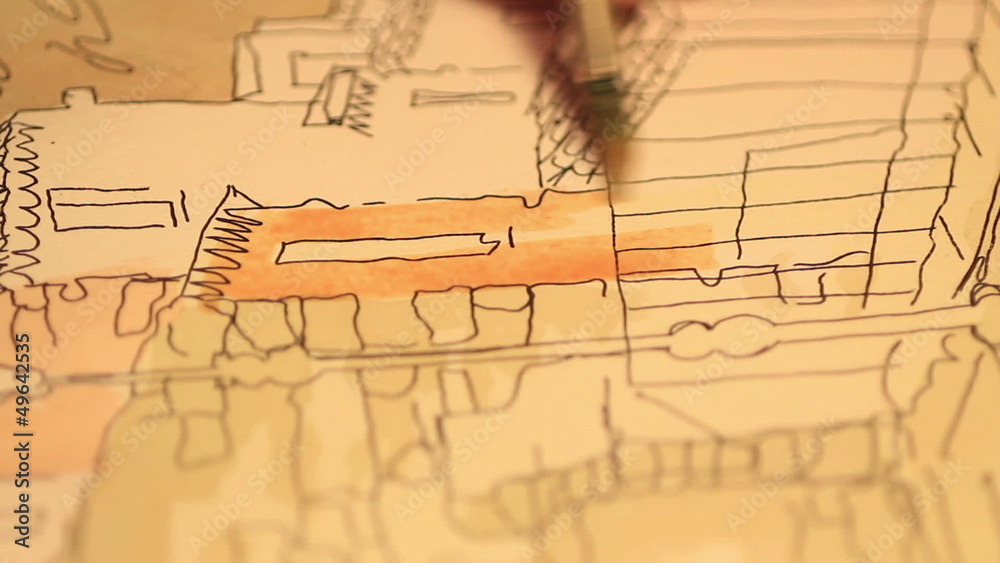 Watercolor painter - hand that paints a landscape Watercolor painter - hand that paints a landscape