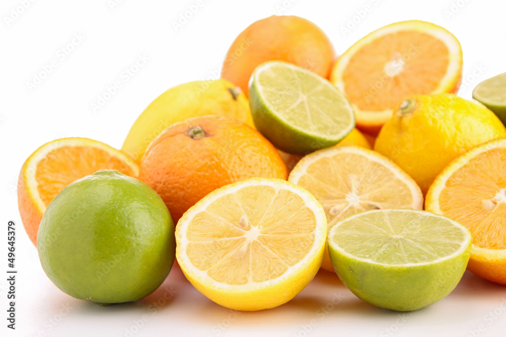 heap of orange, green and yellow lemon